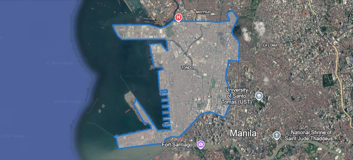 Satellite view of the Tondo district study area, Manila, outlined in blue against Manila Bay